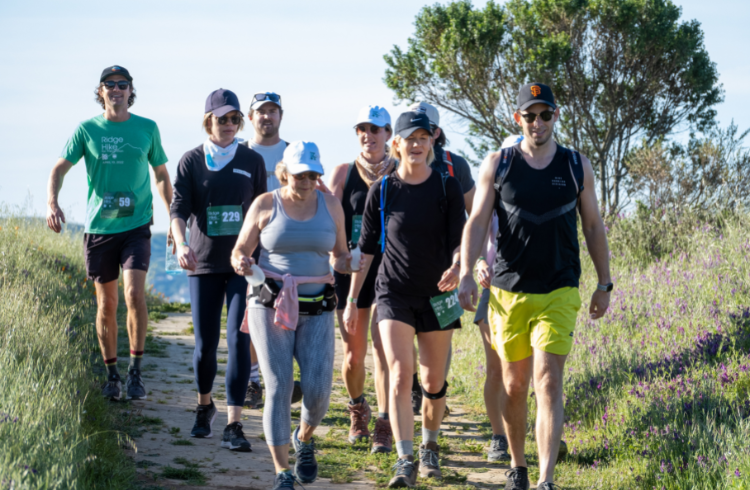 family team of hikers for breast cancer prevention walk