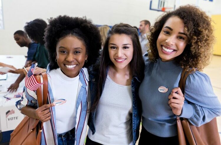 Three friends are happy they went together to vote