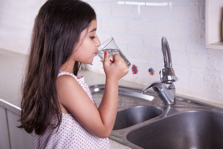 tap water young girl drinks