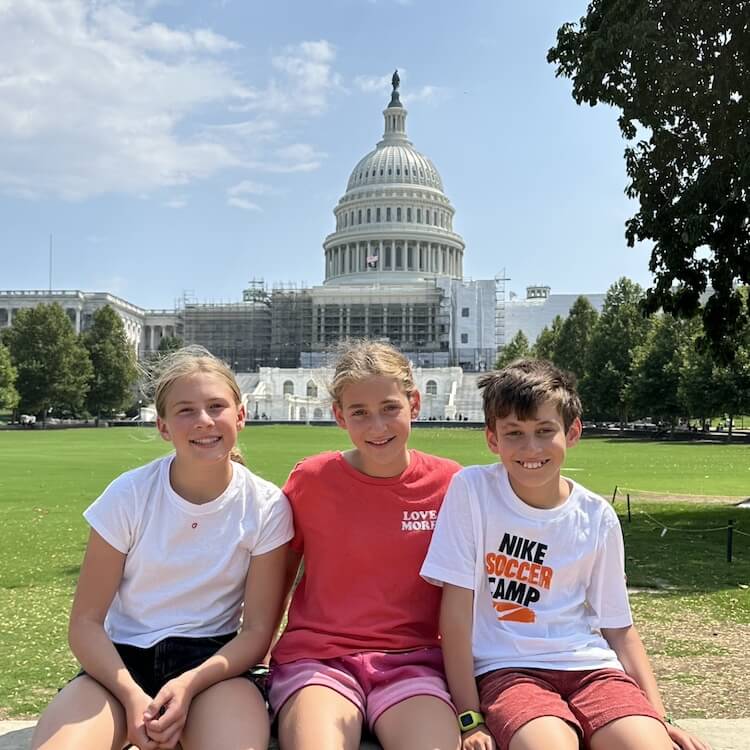 Suzanne Price children in front of white house