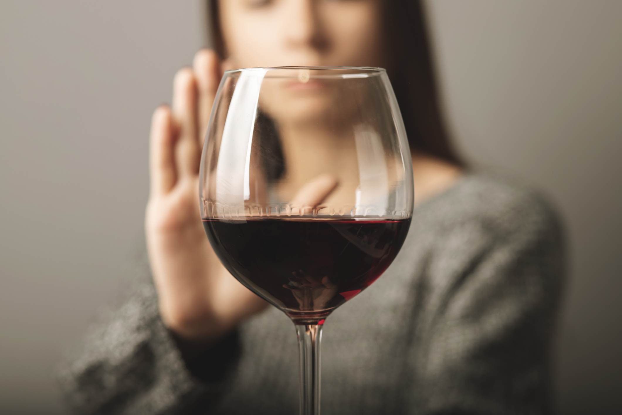 woman not drinking wine alcohol