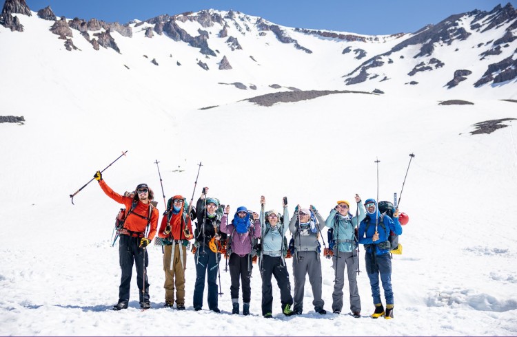Group of 8 climbers from CAO 2026 cheering on the mountainside